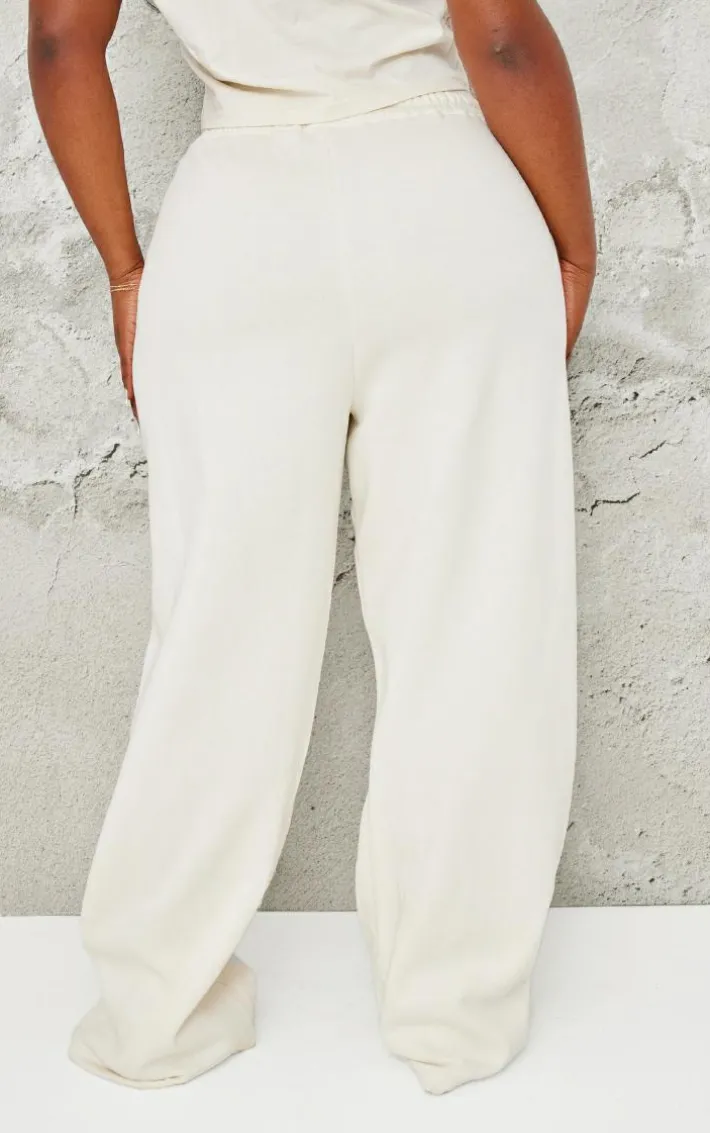 PRETTYLITTLETHING Plus Cream Contrast Embroidery Low Rise Wide Leg Sweatpants