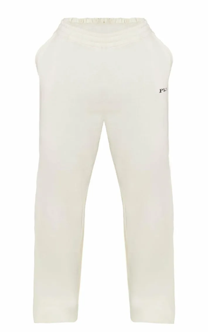 PRETTYLITTLETHING Plus Cream Contrast Embroidery Low Rise Wide Leg Sweatpants