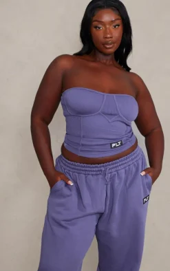 PRETTYLITTLETHING Plus Purple Washed Badge Detail Corset Top