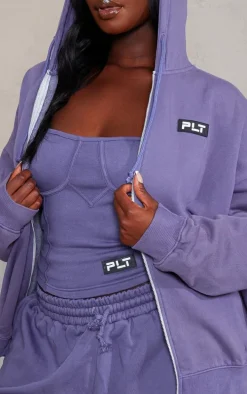 PRETTYLITTLETHING Plus Purple Washed Badge Detail Corset Top