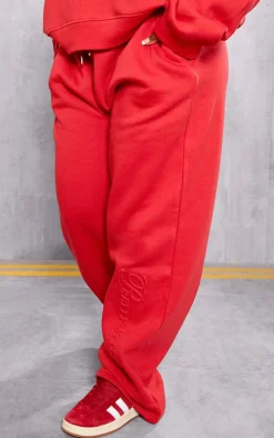 PRETTYLITTLETHING Plus Red Embossed Graphic Straight Leg Sweatpants