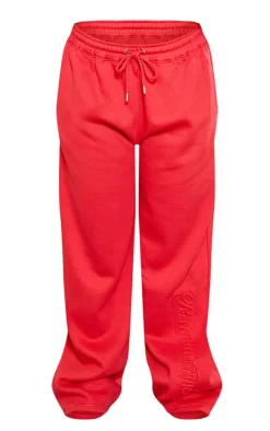 PRETTYLITTLETHING Plus Red Embossed Graphic Straight Leg Sweatpants