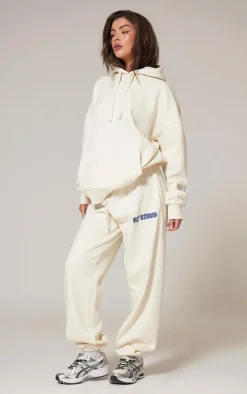 PRETTYLITTLETHING Sand Premium Studio Print Cuffed Sweatpants