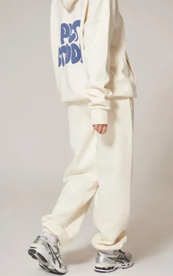 PRETTYLITTLETHING Sand Premium Studio Print Cuffed Sweatpants