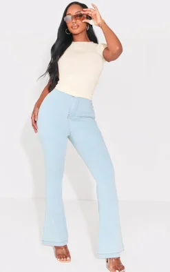 PRETTYLITTLETHING Shape Light Blue Wash Split Hem Detail Flared Jeans