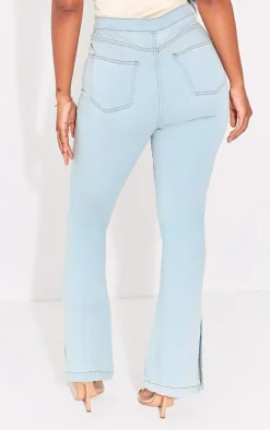 PRETTYLITTLETHING Shape Light Blue Wash Split Hem Detail Flared Jeans