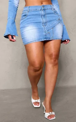 PRETTYLITTLETHING Shape Light Blue Badge Denim Mini Skirt