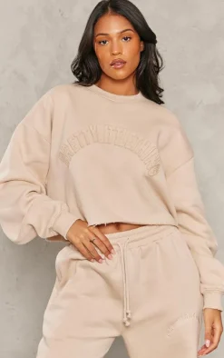 PRETTYLITTLETHING Tall Stone Distressed Varsity Cropped Sweatshirt