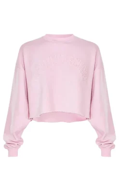 PRETTYLITTLETHING Tall Washed Pink Distressed Varsity Cropped Sweatshirt