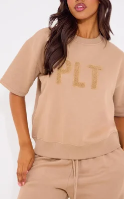 PRETTYLITTLETHING Taupe Borg Applique Short Sleeve Sweatshirt