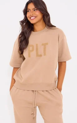 PRETTYLITTLETHING Taupe Borg Applique Short Sleeve Sweatshirt