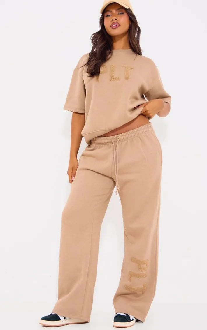 PRETTYLITTLETHING Taupe Borg Applique Wide Leg Sweatpants