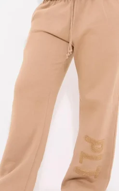 PRETTYLITTLETHING Taupe Borg Applique Wide Leg Sweatpants