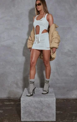 RENEW Cream Rib Seem Detail Mini Skirt