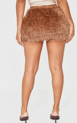 Shape Chocolate Low Rise Faux Leather Tassle Mini Skirt