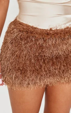 Shape Chocolate Low Rise Faux Leather Tassle Mini Skirt