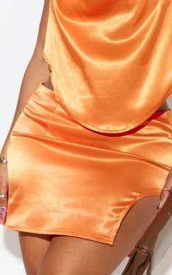 Shape Orange Satin Asymmetric Mini Skirt