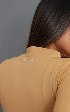 Tan Sport Seamless Dipped Front Long Sleeve Crop Top