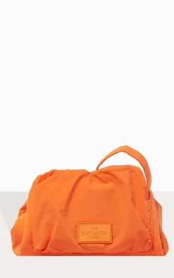 The Flat Lay Co. Drawstring Makeup Bag In Orange Parachute