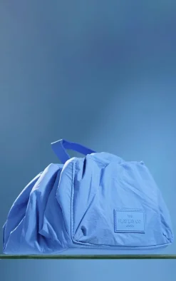 The Flat Lay Co. Drawstring Makeup Bag In Blue Parachute