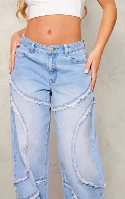 Vintage Light Wash Asymmetric Frayed Detail Mid Rise Straight Leg Jeans