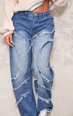 Vintage Mid Wash Asymmetric Frayed Detail Mid Rise Straight Leg Jeans