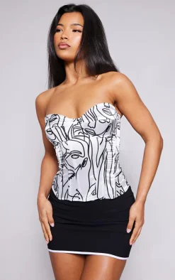 White Abstract Faces Print Satin Corset