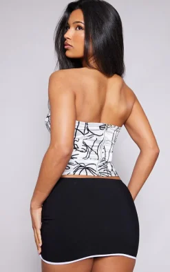 White Abstract Faces Print Satin Corset