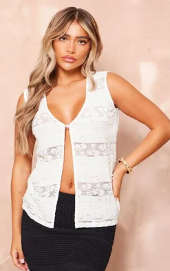 White Sleeveless Textured Lace Vest