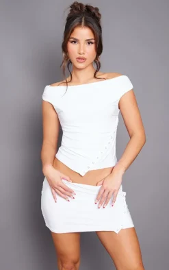 White Slinky Low Rise Slit Hem Eyelet Detail Micro Mini Skirt